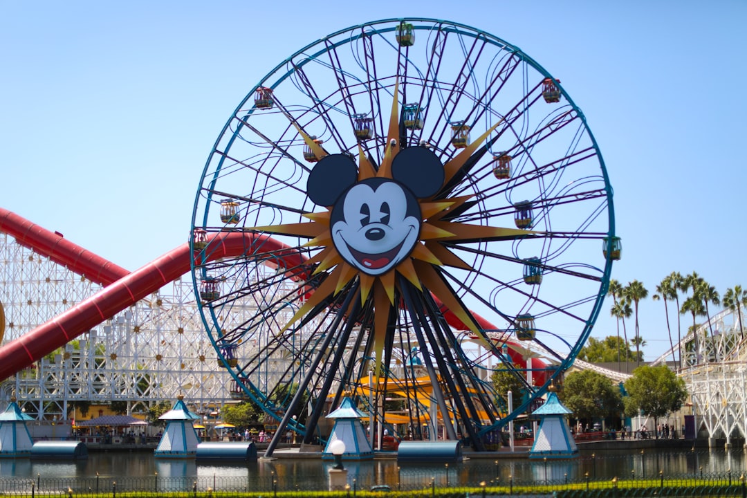 A ferris wheel with a mickey mouse face on it